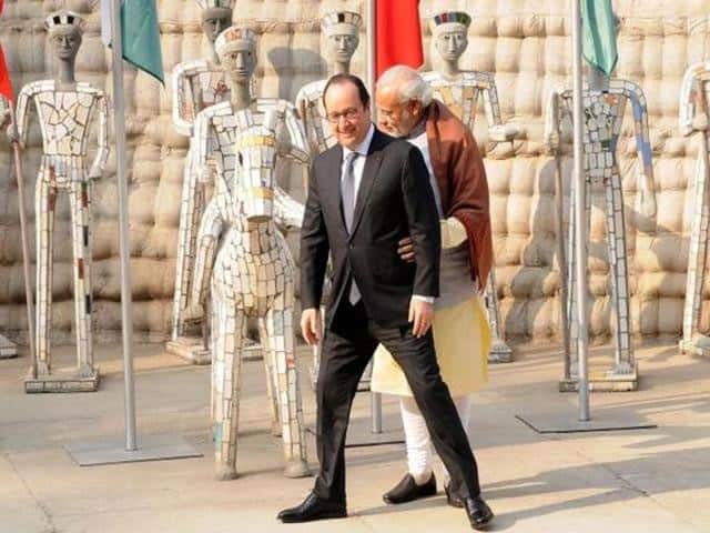 Former French President Hollande and Prime Minister Narendra Modi